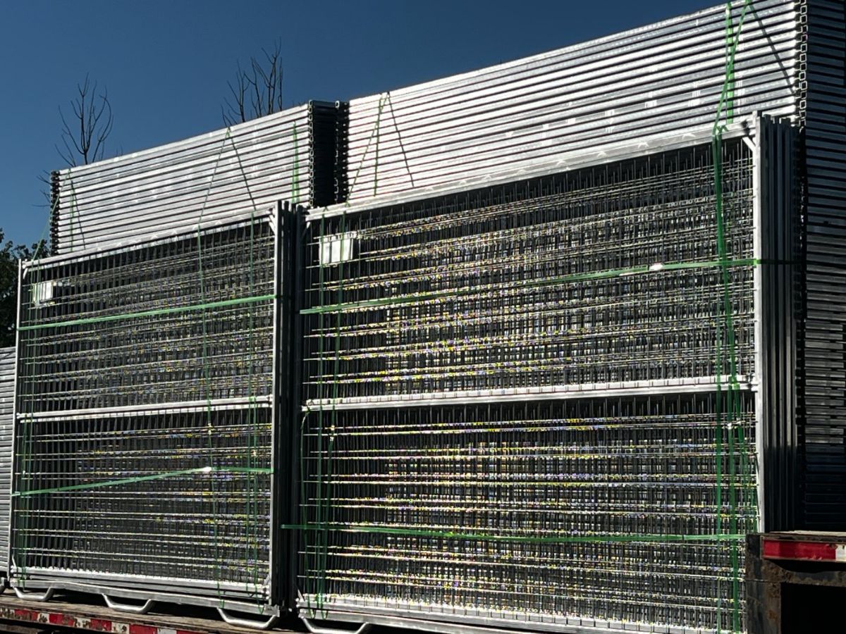 Galvanized finish temporary fence panels bundled and strapped for delivery